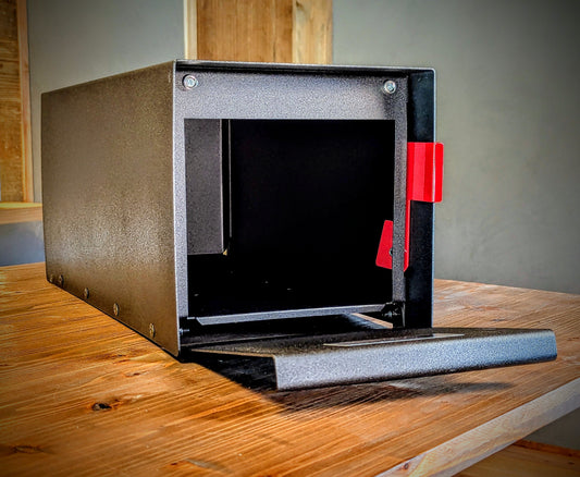 Open modern mailbox on desk 
